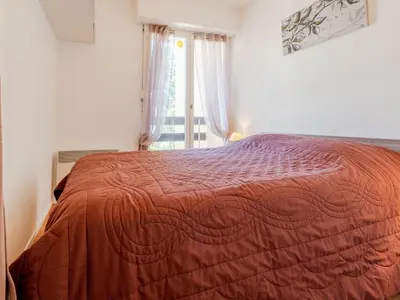 Un ou plusieurs lits dans un hébergement de l'établissement Apartment Le Sporting-18 by Interhome