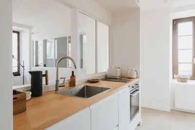 Cuisine ou kitchenette dans l'établissement La Haute Ville