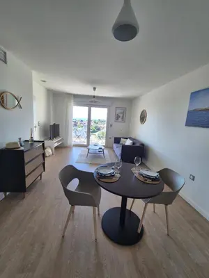 Coin salon dans l'établissement Oh Activ Donville-Les-Bains - Résidence Services Seniors