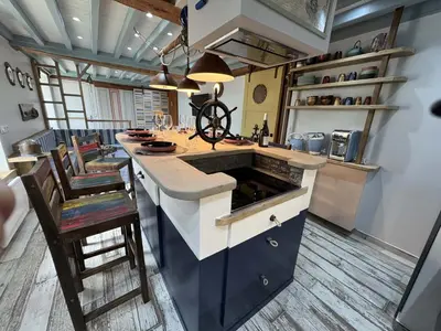 Cuisine ou kitchenette dans l'établissement Riva Bella Marine