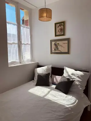 Un ou plusieurs lits dans un hébergement de l'établissement Bel appartement lumineux Cabourg - 30 m de la mer - Jardin