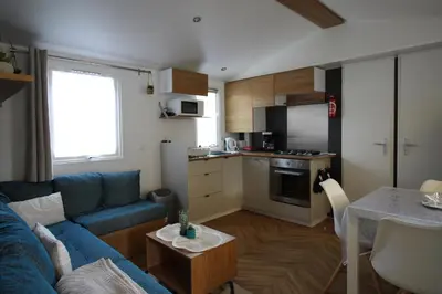 Cuisine ou kitchenette dans l'établissement Le Domaine de Litteau 4 étoiles à LITTEAU emplacement 403 2CH 1SDB 6 personnes