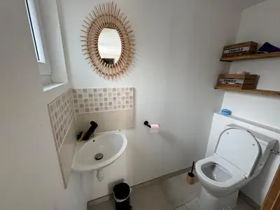 Salle de bains dans l'établissement Gite de Pouppeville