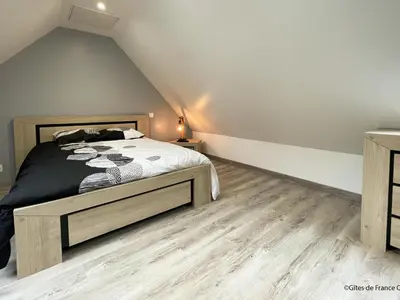 Un ou plusieurs lits dans un hébergement de l'établissement Gîte Confortable pour 2 avec Terrasse et WIFI en Normandie - FR-1-497-253