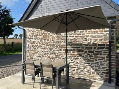 Terrasse ou espace extérieur de l'établissement Gîte Confortable pour 2 avec Terrasse et WIFI en Normandie - FR-1-497-253