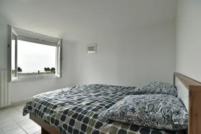 Un ou plusieurs lits dans un hébergement de l'établissement La Petite Cancalaise - Proche Plage