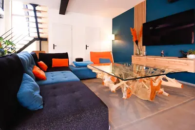 Coin salon dans l'établissement Grange rénovée- 3 chambres spa