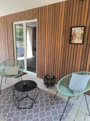 Coin salon dans l'établissement Ancienne grange rénovée