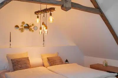Un ou plusieurs lits dans un hébergement de l'établissement La Maison de Montsecret - Maison paisible pour 6p