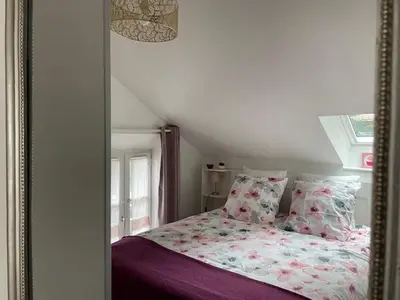 Un ou plusieurs lits dans un hébergement de l'établissement Cottage in Central Bayeux