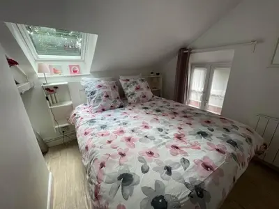 Un ou plusieurs lits dans un hébergement de l'établissement Cottage in Central Bayeux