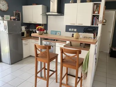 Cuisine ou kitchenette dans l'établissement L'effet mer
