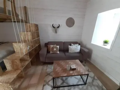 Coin salon dans l'établissement Le lodge - appartement 4 personnes proche mer