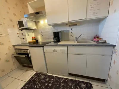 Cuisine ou kitchenette dans l'établissement Vue sur la marina-6 pers à Courseulles sur Mer
