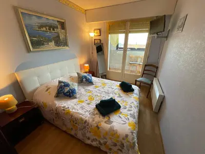 Un ou plusieurs lits dans un hébergement de l'établissement Vue sur la marina-6 pers à Courseulles sur Mer