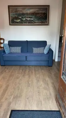 Coin salon dans l'établissement Petite maison plage et port de plaisance à pied