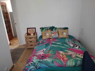 Un ou plusieurs lits dans un hébergement de l'établissement Hébergement dans une grande maison à la campagne