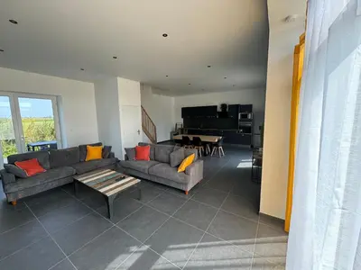 Coin salon dans l'établissement Gîtes Les Rives du Mont