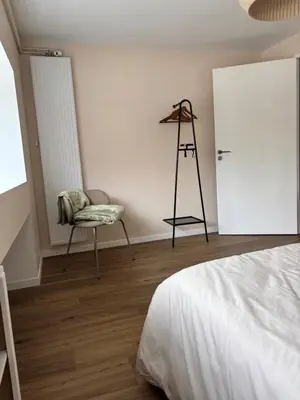 Un ou plusieurs lits dans un hébergement de l'établissement Cozy Loft tout équipé au cœur de Saint-Lô