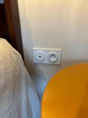 Un ou plusieurs lits dans un hébergement de l'établissement Cozy Loft tout équipé au cœur de Saint-Lô