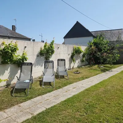Jardin de l'établissement Gîte 3 étoiles à Lessay, Jardin clos, 3 chambres, proche plages, chiens acceptés