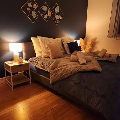 Un ou plusieurs lits dans un hébergement de l'établissement Gîte 3 étoiles à Lessay, Jardin clos, 3 chambres, proche plages, chiens acceptés