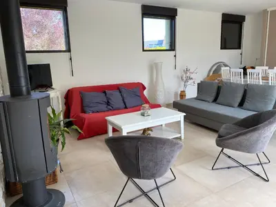 Coin salon dans l'établissement grand studio campagne Normande proche mer