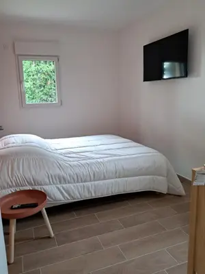 Un ou plusieurs lits dans un hébergement de l'établissement Gîte entre terre et baie,20min du Mont-St-Michel wifi