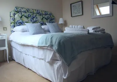 Un ou plusieurs lits dans un hébergement de l'établissement Hotel Restaurant Le Lion Verd