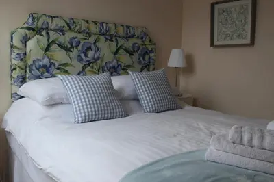 Un ou plusieurs lits dans un hébergement de l'établissement Hotel Restaurant Le Lion Verd