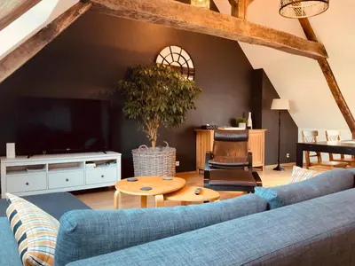 Télévision ou salle de divertissement dans l'établissement La tête dans les étoiles