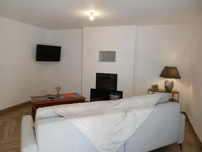 Télévision ou salle de divertissement dans l'établissement Maison de charme
