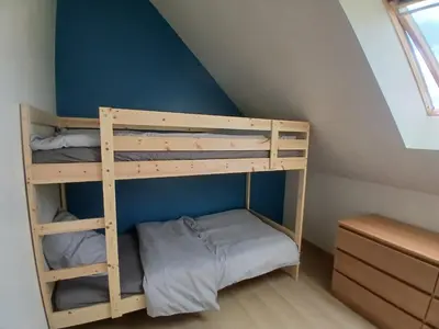 Un ou plusieurs lits dans un hébergement de l'établissement Gîte 4-5 personnes proche navette Orano