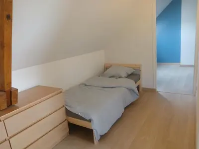 Un ou plusieurs lits dans un hébergement de l'établissement Gîte 4-5 personnes proche navette Orano