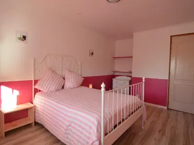 Un ou plusieurs lits dans un hébergement de l'établissement Holiday Home in Saint-Clément near the Sea