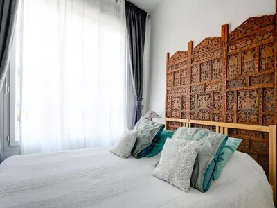 Un ou plusieurs lits dans un hébergement de l'établissement Romantic Stay, Isigny-sur-Mer