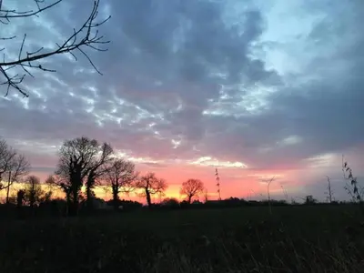 Lever ou coucher de soleil vu de la maison de vacances ou à proximité