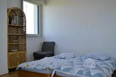 Un ou plusieurs lits dans un hébergement de l'établissement Villa des Perelles