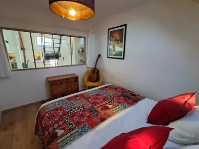 Un ou plusieurs lits dans un hébergement de l'établissement Le Petit Vert, loft convivial à la campagne