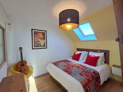 Un ou plusieurs lits dans un hébergement de l'établissement Le Petit Vert, loft convivial à la campagne