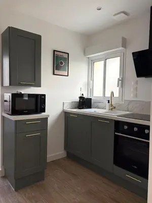 Cuisine ou kitchenette dans l'établissement Appartement neuf - Equeurdreville centre