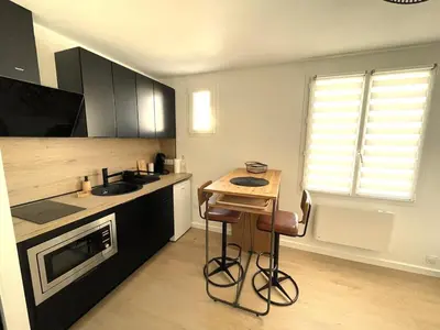 Cuisine ou kitchenette dans l'établissement 2 pièces Cosy avec parking privé