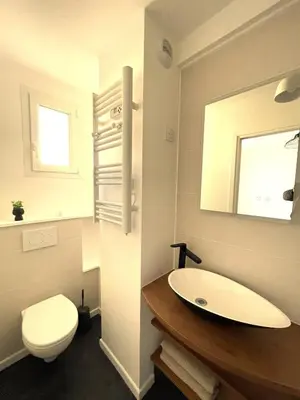 Salle de bains dans l'établissement 2 pièces Cosy avec parking privé