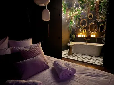Un ou plusieurs lits dans un hébergement de l'établissement Suite Romantique, hyper centre