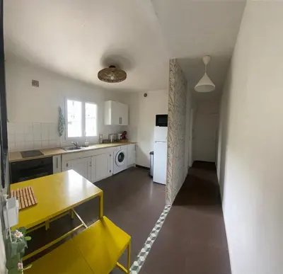 Cuisine ou kitchenette dans l'établissement Aparte zénith parking gratuit