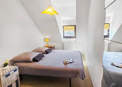 Un ou plusieurs lits dans un hébergement de l'établissement Duplex vue mer, balcon, parking privé
