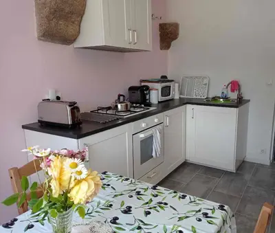 Cuisine ou kitchenette dans l'établissement Magnolia - Cozy 3 star Cottage with heated pool and hot tub