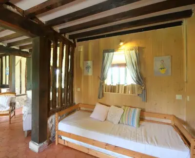 Un ou plusieurs lits dans un hébergement de l'établissement MAISONS Capucine et Rose