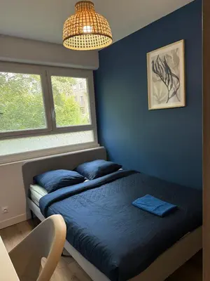Un ou plusieurs lits dans un hébergement de l'établissement Spacious 4 bedroom family home 5 min from Caen