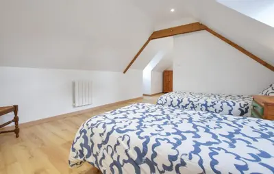 Un ou plusieurs lits dans un hébergement de l'établissement Maison De Charme Proche Mer